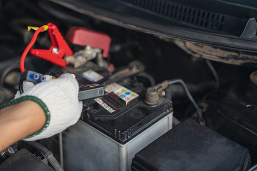 close-up-of-mechanic-holding-voltmeter-to-check-vo-2024-12-08-01-00-07-utc-1-min.jpg